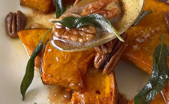 Adding brown butter, pecans and sage to roasted pumpkin