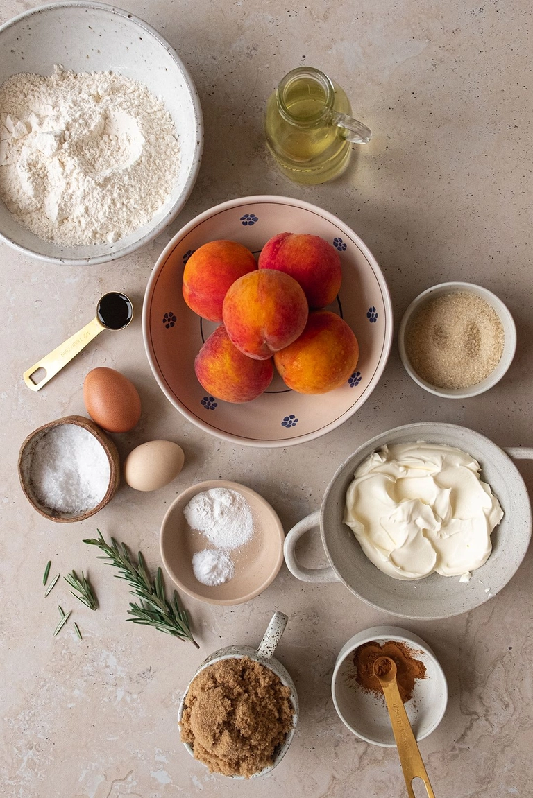 Ingredients to make peach, rosemary and olive oil muffins