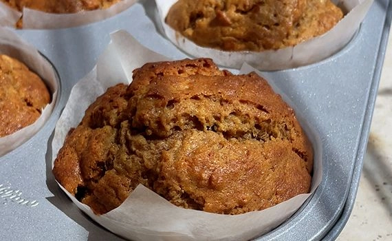 Baked banana muffins in a tray