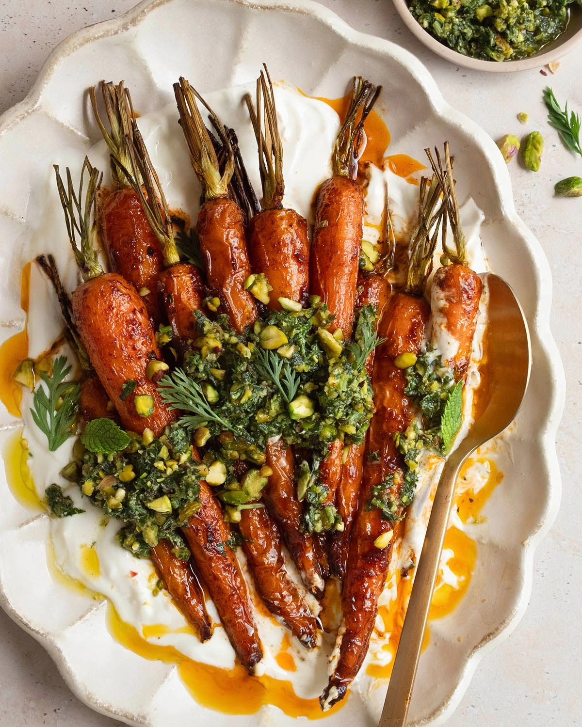 Honey Harissa Carrots with Carrot Top Pistachio Pesto 