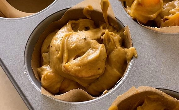 Muffin batter in a tray