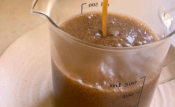 Adding the caramel to a jug