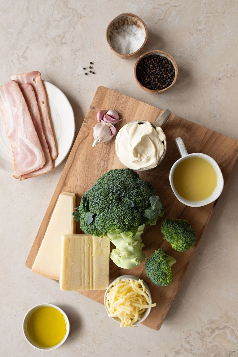 Ingredients to make cheesy bacon broccoli bake