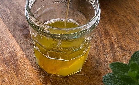 Adding dressing ingredients to a jar