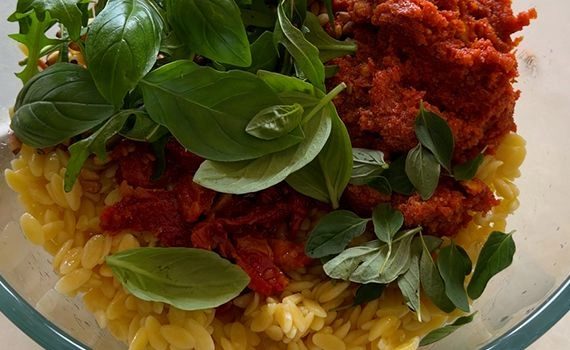 Ingredients for sun-dried tomato pasta salad.