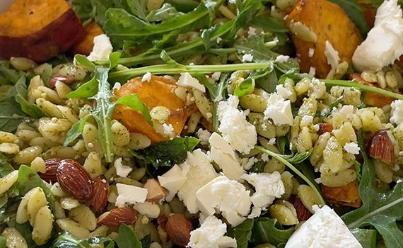 Close up of orzo pesto pasta salad 