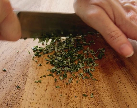 Chopping rosemary