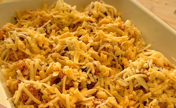 Grated cheese over cauliflower