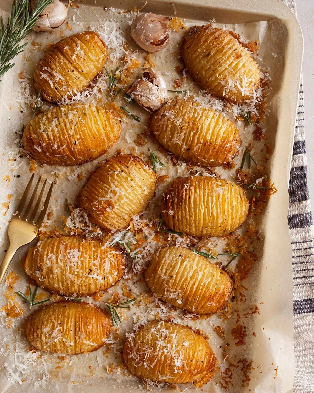 Duck Fat Hasselback Potatoes with Parmesan